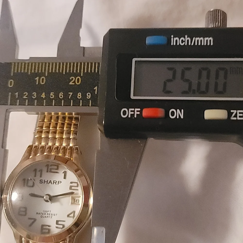 NOS NEW Sharp Ladies Watch Date SHP 5105 Vintage Goldtone Expanding Metal Band‎